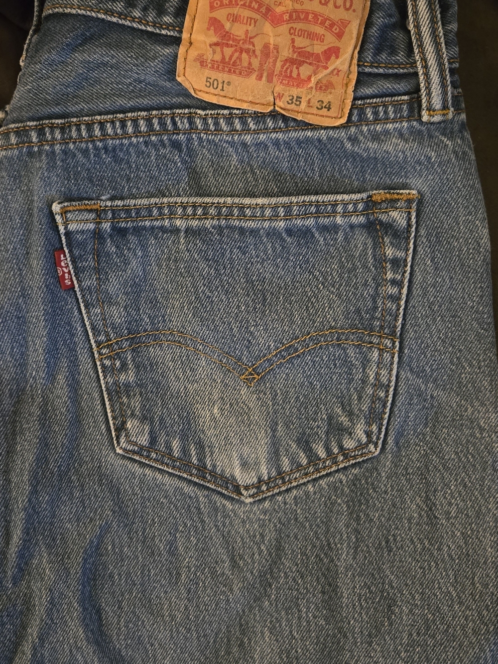 Levi's Men's Straight Blue Denim Jeans with Signature Back Pocket